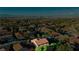 Picturesque aerial view of the property and neighborhood with mountain backdrop at 7427 Tomahawk Bend Ave, Las Vegas, NV 89113