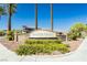 Welcome to Nevada Trails community sign with beautiful landscaping and stone accents at 7427 Tomahawk Bend Ave, Las Vegas, NV 89113