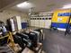 Spacious garage that has been converted into a home gym with rubber mat flooring at 7427 Tomahawk Bend Ave, Las Vegas, NV 89113