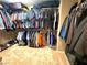 Spacious walk-in closet with custom shelving and ample storage space for clothing and accessories at 7427 Tomahawk Bend Ave, Las Vegas, NV 89113