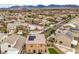 Aerial view of a residential neighborhood with mountain views in the distance at 7948 Eastern Elk St, Las Vegas, NV 89149