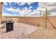 Outdoor patio with brick pavers, grill, and low-maintenance landscaping for relaxing or entertaining guests at 7948 Eastern Elk St, Las Vegas, NV 89149