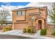 Charming home with solar panels, a stone-accented entrance, and a two-car garage at 7948 Eastern Elk St, Las Vegas, NV 89149