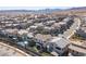 Wide aerial view of a meticulously planned community with mountain views at 828 Parker Mesa St, Las Vegas, NV 89138