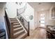 Welcoming entryway with a staircase, wood floors, and stylish decor accents at 828 Parker Mesa St, Las Vegas, NV 89138