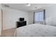 Cozy bedroom featuring a dresser with a TV and natural light at 829 N Water St, Henderson, NV 89011