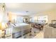 Relaxing bedroom with a king bed, tile flooring, and large mirror closet at 929 Sulphur Springs Ln # 102, Las Vegas, NV 89128