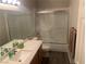 Clean bathroom with a shower-tub combo and a nice vanity at 9505 Belgate Ct, Las Vegas, NV 89129