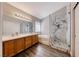 Modern bathroom with double sink vanity, soaking tub and walk-in shower at 9505 Belgate Ct, Las Vegas, NV 89129