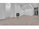 Cozy living room includes a modern fireplace and large tiled flooring at 10739 Agate Cliffs Ave, Las Vegas, NV 89135