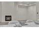 Open-concept living space with a modern fireplace and clean lines at 10739 Agate Cliffs Ave, Las Vegas, NV 89135