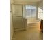 Large bathroom with a tub, shower, and a window at 10799 Flame Vine Ct, Las Vegas, NV 89135