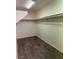 Walk-in closet with built in shelving at 10799 Flame Vine Ct, Las Vegas, NV 89135