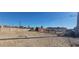 Expansive dirt backyard, ready for landscaping and outdoor activities, including a storage shed and block wall at 1301 Madison Ave, Las Vegas, NV 89106