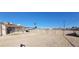 Spacious backyard featuring dirt, a pergola and exterior walls at 1301 Madison Ave, Las Vegas, NV 89106