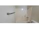 Bathroom featuring a shower-tub combo and toilet, showcasing a clean and functional space at 1301 Madison Ave, Las Vegas, NV 89106