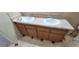 Bathroom featuring a double sink vanity with wood cabinets and a tiled floor at 1301 Madison Ave, Las Vegas, NV 89106