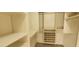 A walk-in closet featuring custom shelving and storage space for shoes and clothing at 1301 Madison Ave, Las Vegas, NV 89106