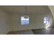 Dining area with chandelier, natural lighting and neutral paint at 1301 Madison Ave, Las Vegas, NV 89106