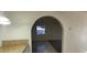 View of the dining room featuring an arched doorway and chandelier at 1301 Madison Ave, Las Vegas, NV 89106