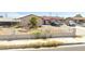A single-story home featuring desert landscaping with a wrought iron fence at 1301 Madison Ave, Las Vegas, NV 89106