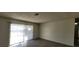 Bright living room with sliding glass doors and contemporary flooring at 1301 Madison Ave, Las Vegas, NV 89106