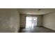 Bright living room featuring hardwood floors, a sliding glass door and an open space at 1301 Madison Ave, Las Vegas, NV 89106
