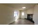 Cozy living room with a fireplace and modern flooring at 1301 Madison Ave, Las Vegas, NV 89106