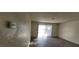 Open living area featuring modern flooring and sliding glass doors at 1301 Madison Ave, Las Vegas, NV 89106