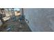 The side of the home with stucco exterior and side yard at 1301 Madison Ave, Las Vegas, NV 89106