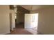 Inviting entryway showcasing tile flooring, natural light, and an open floor plan at 1325 Fiesta Grande Ct, North Las Vegas, NV 89031