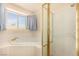 Bathroom featuring a tub, a separate shower, and tile flooring at 1339 Echo Creek St, Henderson, NV 89052
