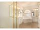 Well-lit bathroom featuring a glass-enclosed shower and a soaking tub at 1339 Echo Creek St, Henderson, NV 89052