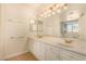 Bathroom with double sink vanity and large mirrors at 1339 Echo Creek St, Henderson, NV 89052