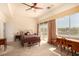 Sunlit bedroom boasts large windows and a charming writing desk at 1339 Echo Creek St, Henderson, NV 89052