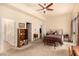 Bright, carpeted bedroom with direct access to the balcony at 1339 Echo Creek St, Henderson, NV 89052