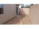 The backyard features a gravel area with pavers and a stone wall at 2100 Fred Brown Dr, Las Vegas, NV 89106