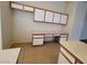 Open kitchen features countertops and cabinets on the left wall, and a tile floor at 2100 Fred Brown Dr, Las Vegas, NV 89106
