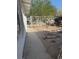 Exterior shot of a home's backyard, revealing the outdoor potential at 2109 Glider St, North Las Vegas, NV 89030