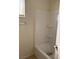 Features bathtub with shower at 2109 Glider St, North Las Vegas, NV 89030