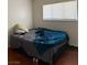 Bedroom featuring hardwood floors and a bed with linens at 2109 Glider St, North Las Vegas, NV 89030