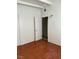 Features wood flooring and view into another room at 2109 Glider St, North Las Vegas, NV 89030