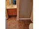 Tiled bathroom with single vanity and walk-in shower at 2200 Highpointe Dr # 201, Laughlin, NV 89029