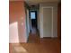 Inviting hallway with neutral walls and wood-look flooring at 2200 Highpointe Dr # 201, Laughlin, NV 89029