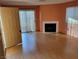 Spacious living room with fireplace and sliding glass doors to patio at 2200 Highpointe Dr # 201, Laughlin, NV 89029