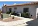 Exterior view of building with beige paint and tile roof at 227 Big Horn Dr, Boulder City, NV 89005