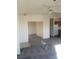 Spacious living room with overhead ceiling fan and view into hallway and kitchen at 227 Big Horn Dr, Boulder City, NV 89005