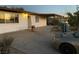 Image showing the backyard with a concrete patio, light fixture and an overhanging roof at 2564 San Marcos St, Las Vegas, NV 89115