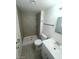 A recently renovated bathroom with a tiled walk-in shower and vanity with new fixtures and a mirror at 2564 San Marcos St, Las Vegas, NV 89115