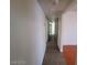 Hallway featuring access to rooms and storage cabinets at 2564 San Marcos St, Las Vegas, NV 89115